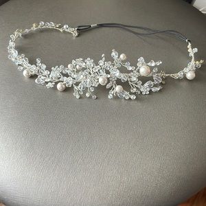 Beautiful bridal head piece by Maritzas Bridal Veil Inc.